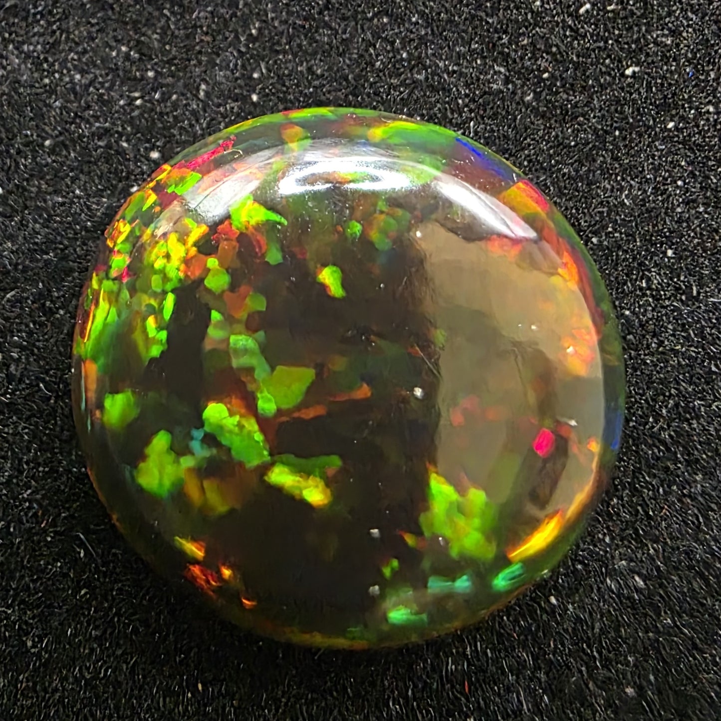 Black Opal special Ethiopian Welo, 6.05 ct oval polished, natural, intense Play-of-Colour