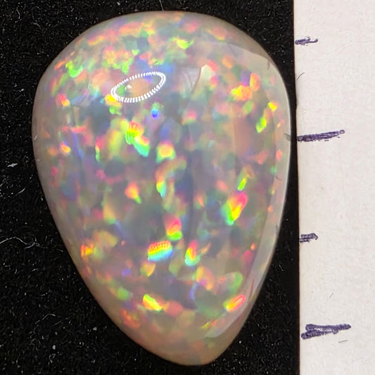 Black Opal special Ethiopian Welo, 10.3 ct pear polished, natural, intense Play-of-Colour