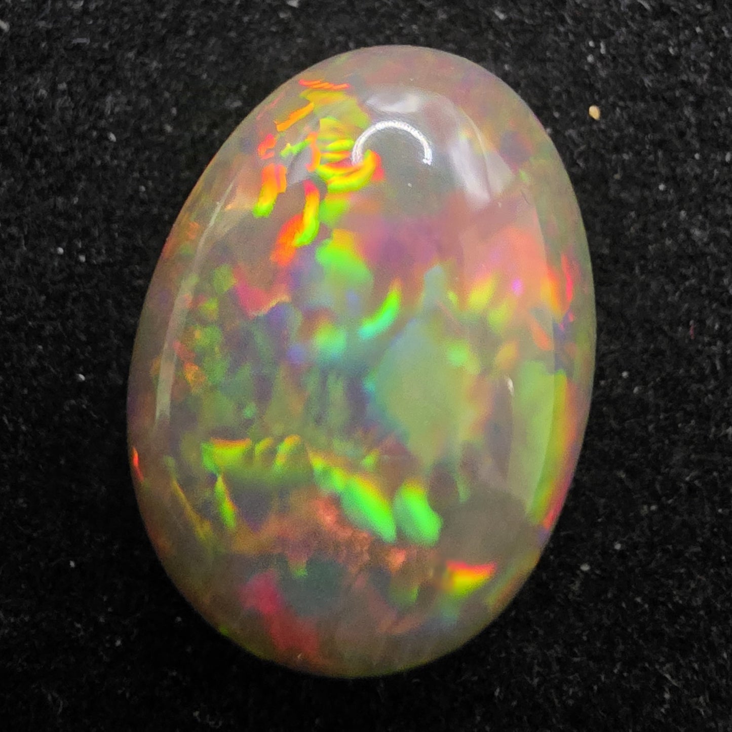 Black Opal special Ethiopian Welo, 5.35 ct oval polished, natural, intense Play-of-Colour