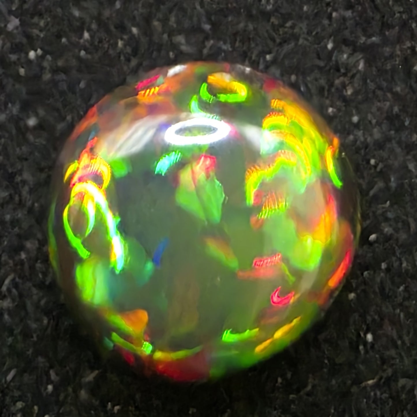 Black Opal special Ethiopian Welo, 2.45 ct freeform polished, natural, intense Play-of-Colour