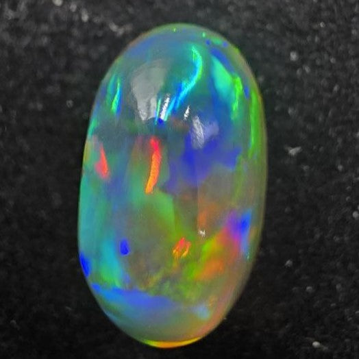 Black Opal special Ethiopian Welo, 4.8 ct oval polished, natural, intense Play-of-Colour