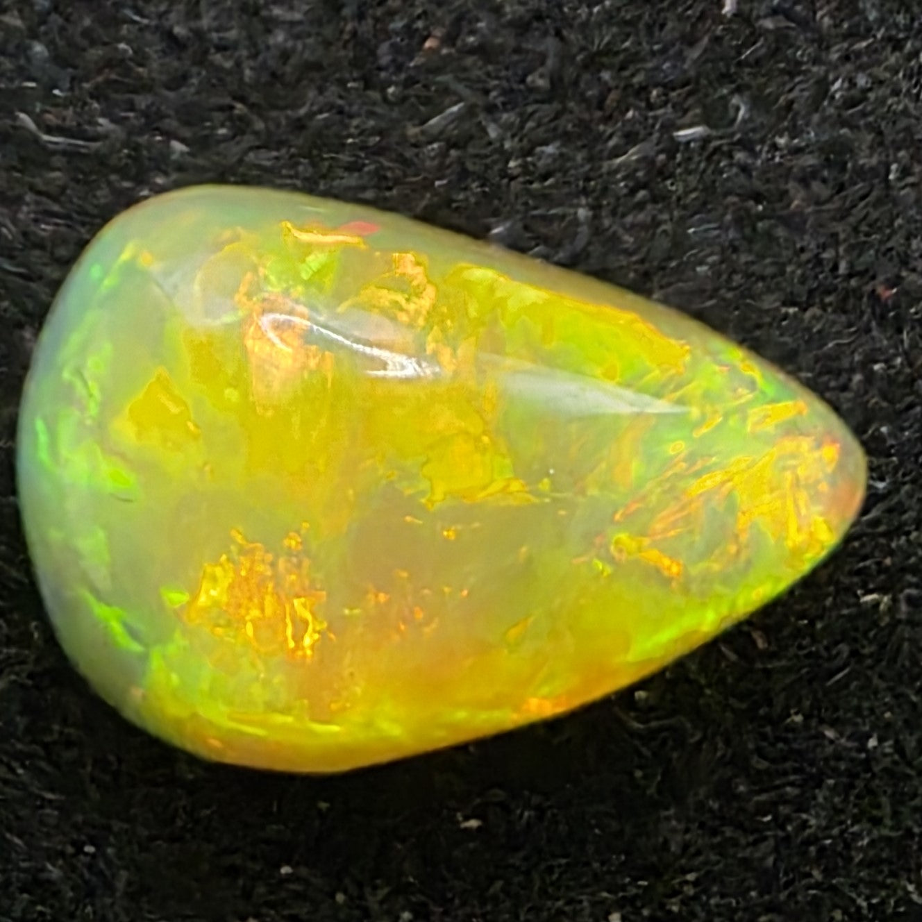 Black Opal Ethiopian Welo, 1.15 ct pear polished, natural