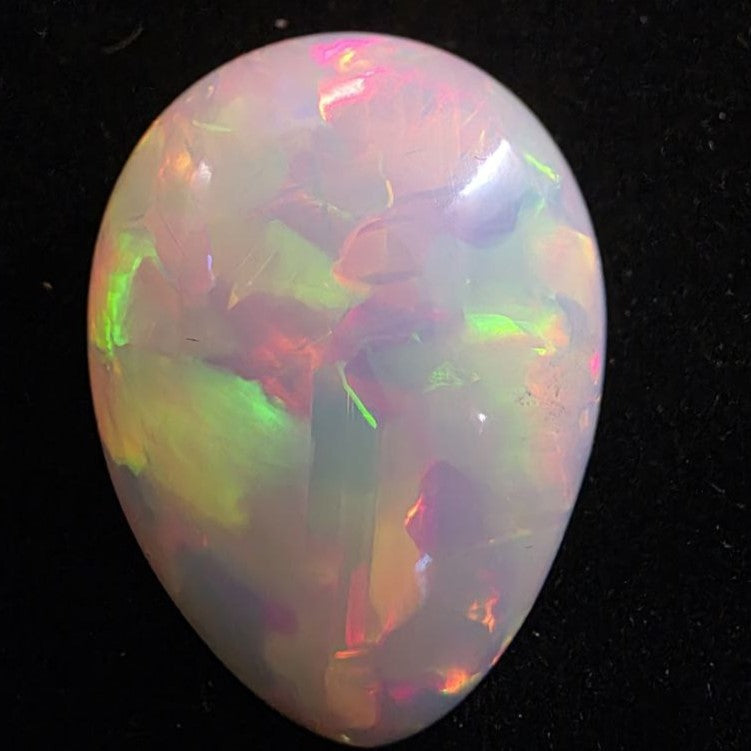 White Opal special Ethiopian Welo, 22.9 ct pear polished, natural, intense Play-of-Colour