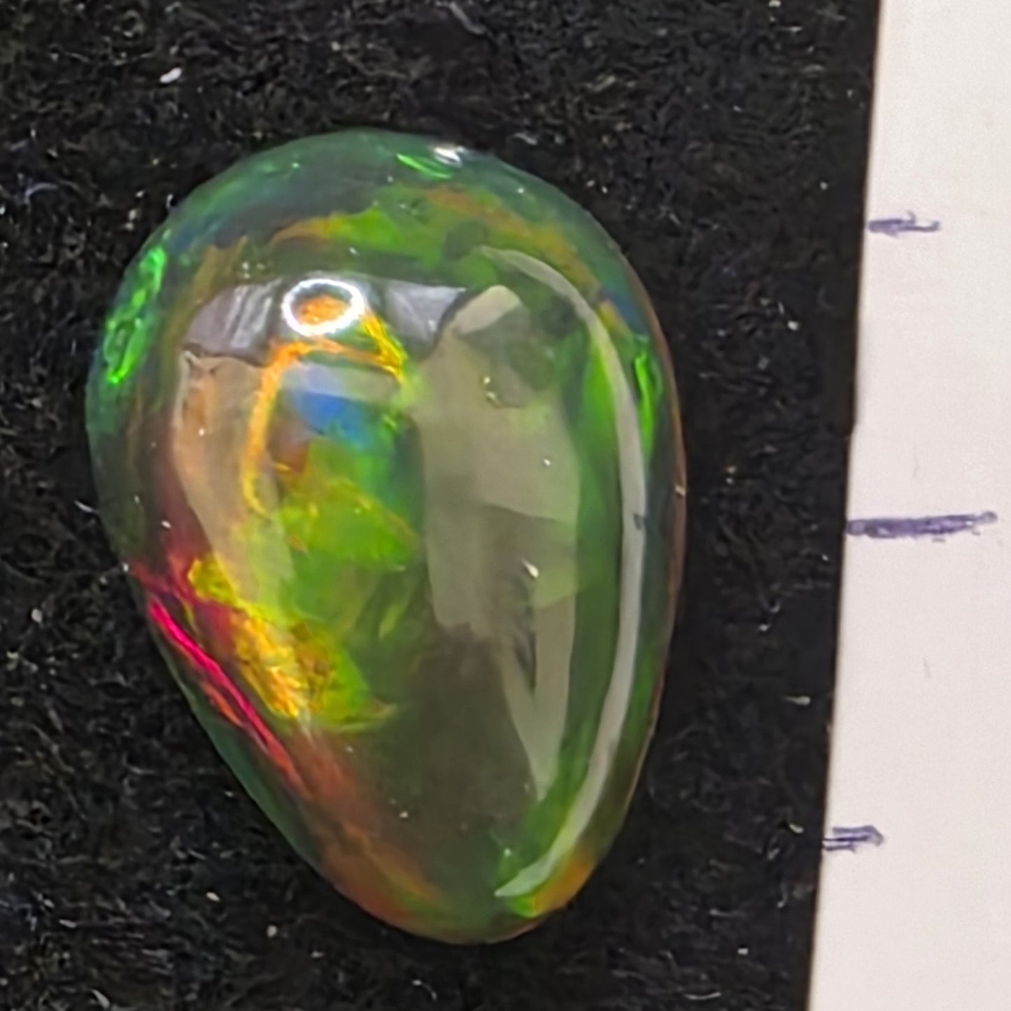 Black Opal special Ethiopian Welo, 3.95 ct pear polished, natural, intense Play-of-Colour