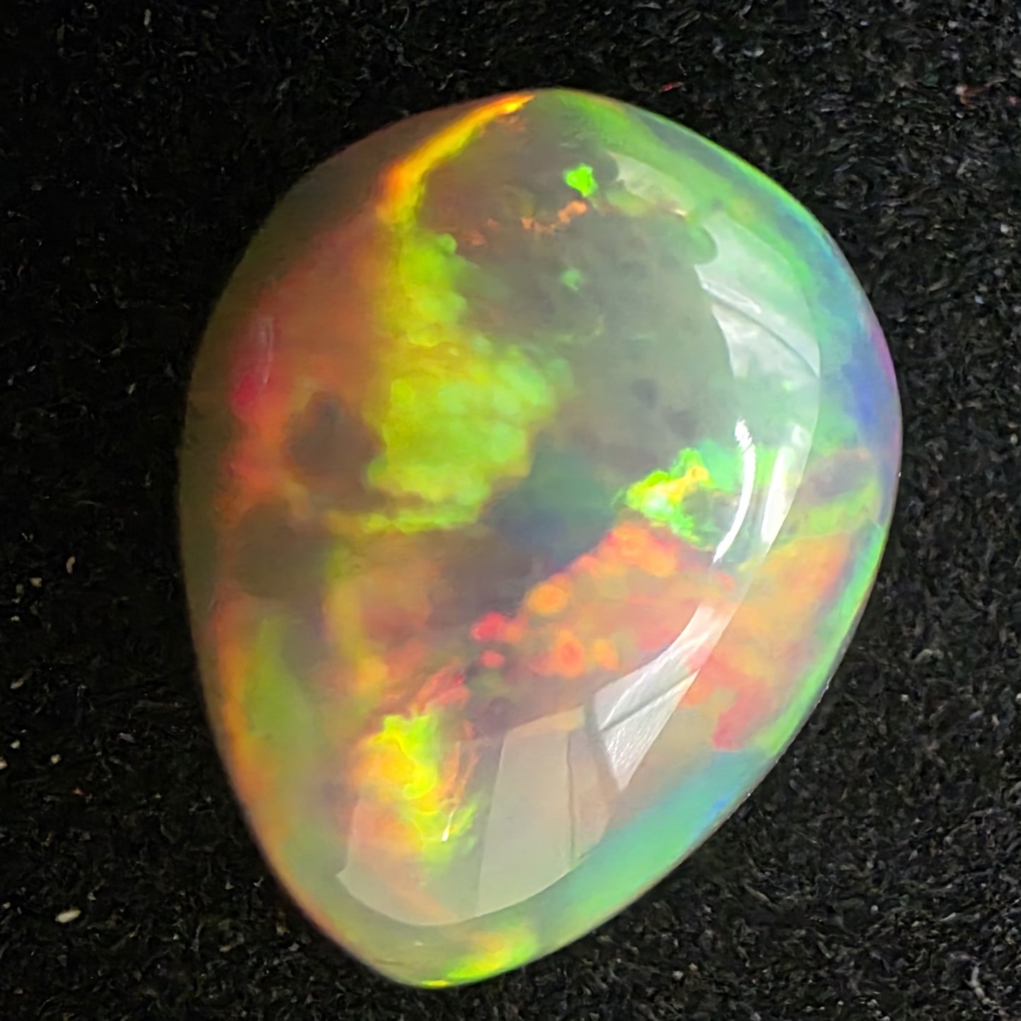 Black Opal special Ethiopian Welo, 3.85 ct pear polished, natural, intense Play-of-Colour
