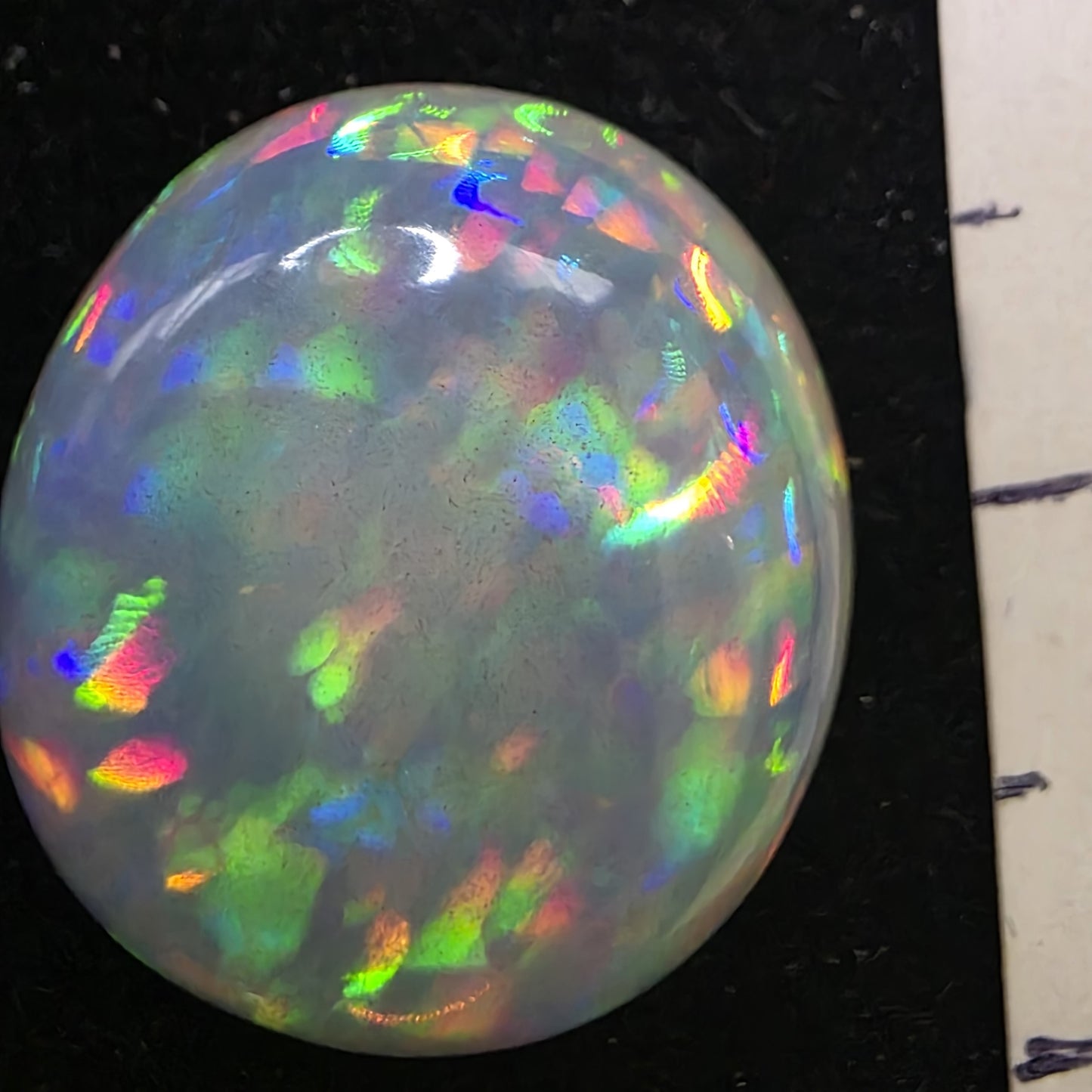 Crystal Opal special Ethiopian Welo, 9.3 ct oval polished, natural