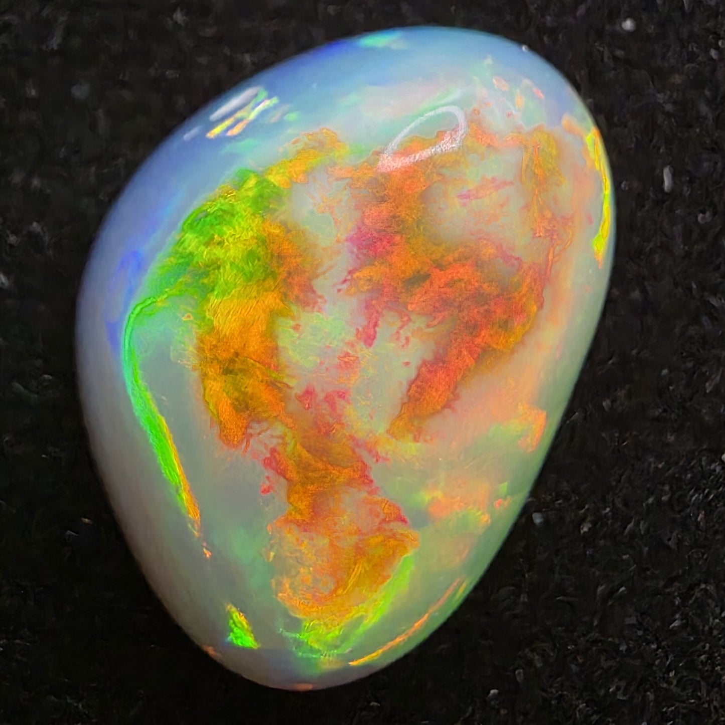 White Opal special Ethiopian Welo, 8.6 ct freeform polished, natural, intense Play-of-Colour