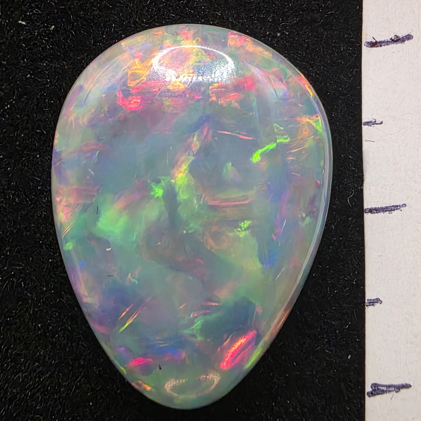 White Opal special Ethiopian Welo, 11 ct pear polished, natural, intense Play-of-Colour