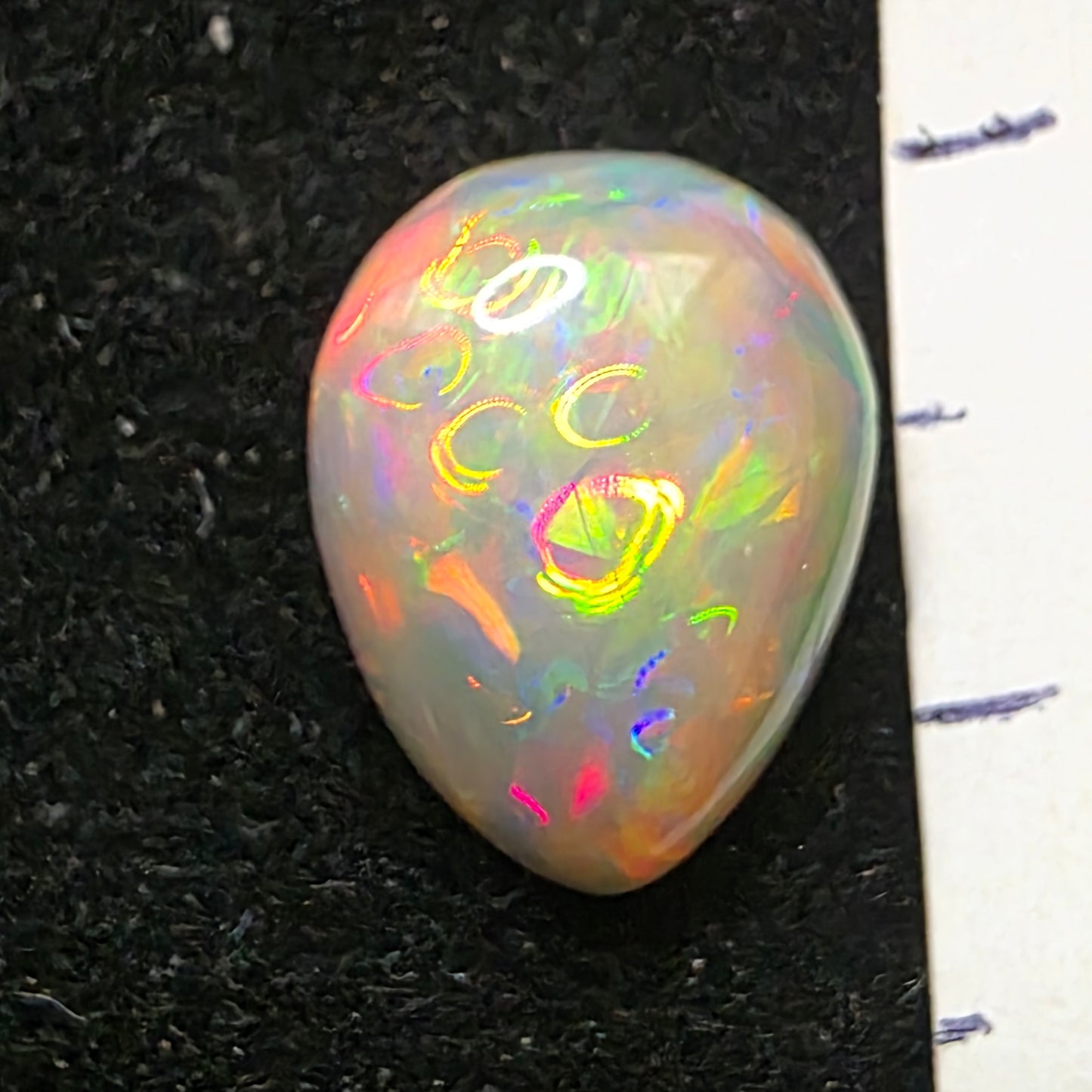 Black Opal special Ethiopian Welo, 2.65 ct pear polished, natural, intense Play-of-Colour
