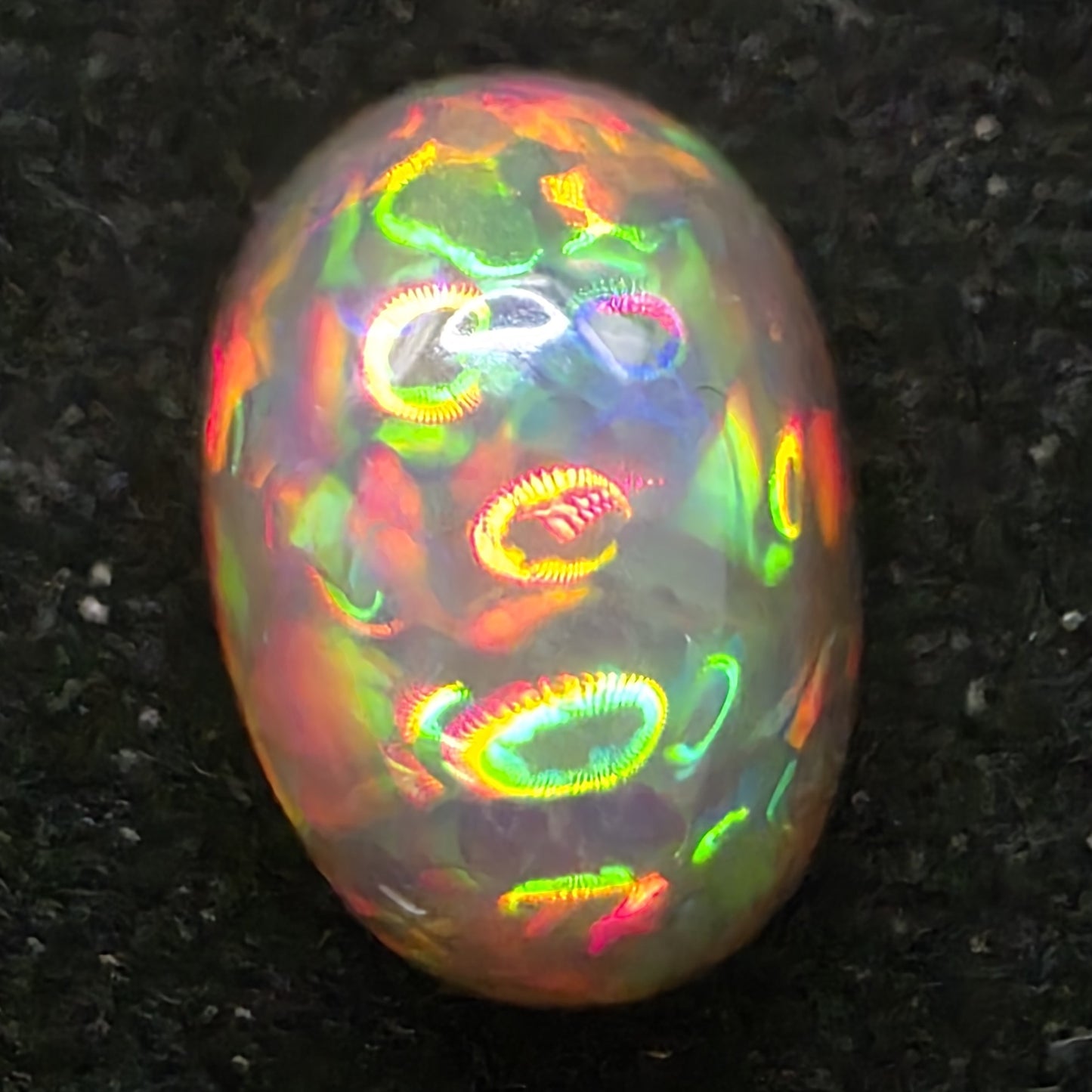 Black Opal special Ethiopian Welo, 6.05 ct oval polished, natural, intense Play-of-Colour