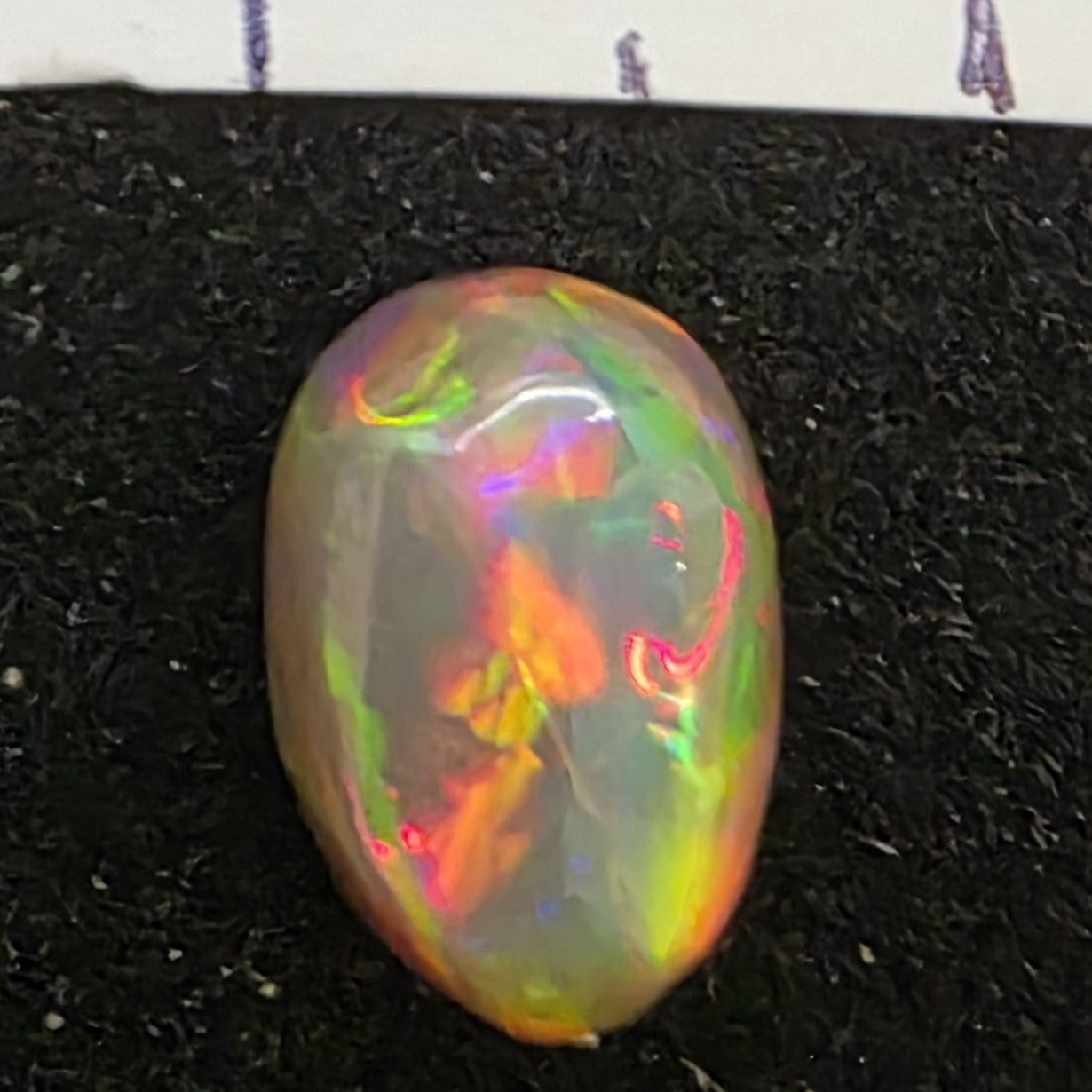 Black Opal special Ethiopian Welo, 1.45 ct oval polished, natural