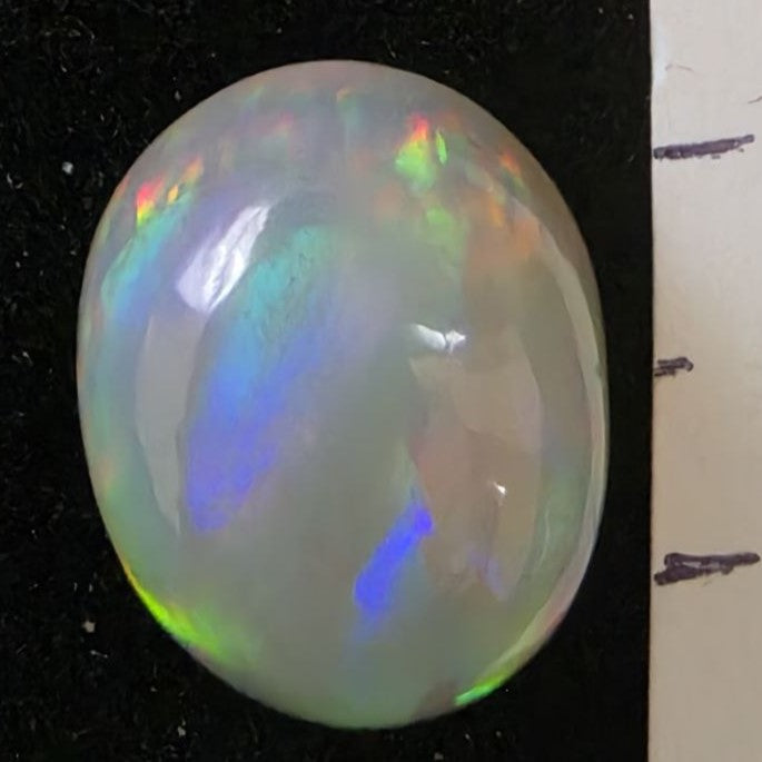 Black Opal special Ethiopian Welo, 7.25 ct oval polished, natural, intense Play-of-Colour