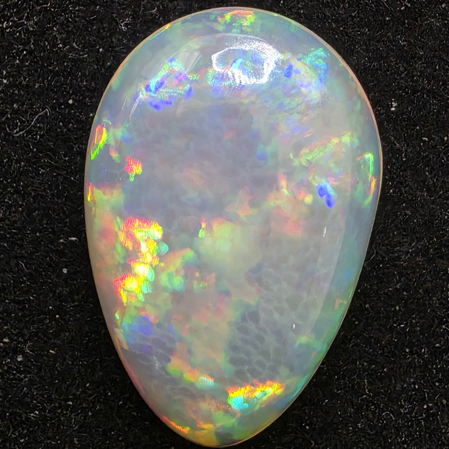 White Opal special Ethiopian Welo, 8.5 ct pear polished, natural, intense Play-of-Colour