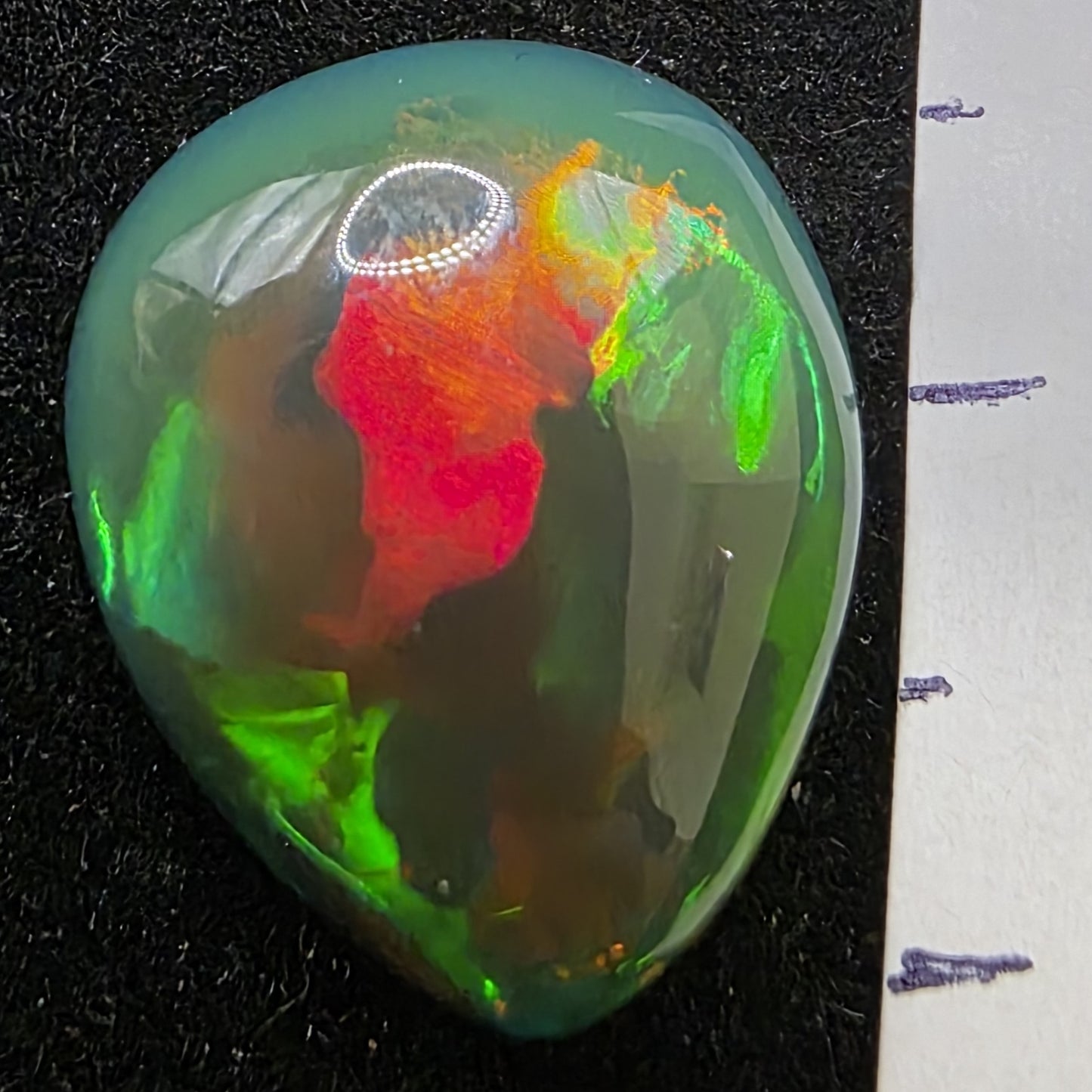 Black Opal special Ethiopian Welo, 6.7 ct pear polished, natural