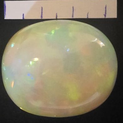 BIG stone! White Opal special Ethiopian Welo, 71.3 ct oval polished, natural, intense Play-of-Colour