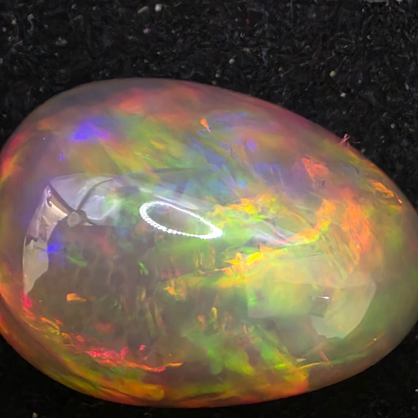 Black Opal special Ethiopian Welo, 18.4 ct pear polished, natural, intense Play-of-Colour