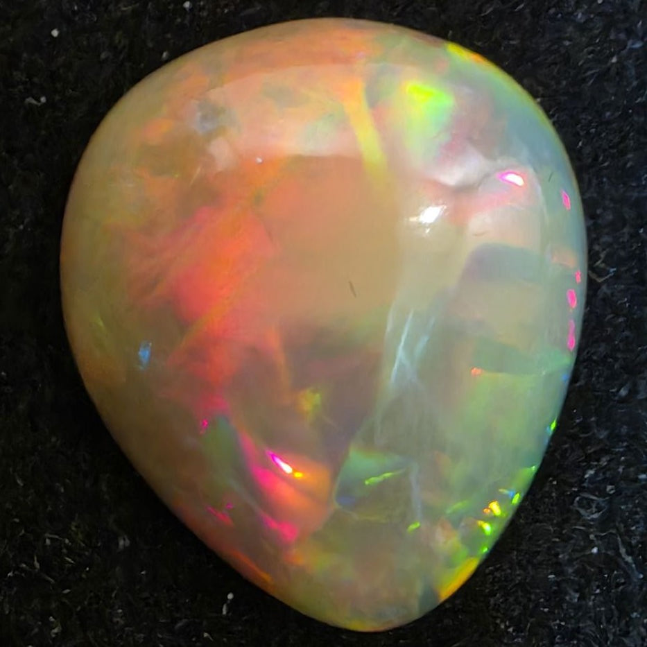 Black Opal special Ethiopian Welo, 12.25 ct pear polished, natural