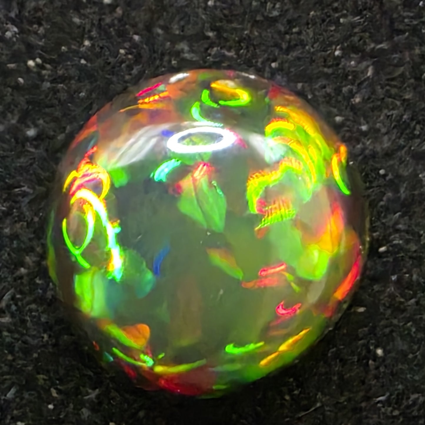 Black Opal special Ethiopian Welo, 2.45 ct freeform polished, natural, intense Play-of-Colour