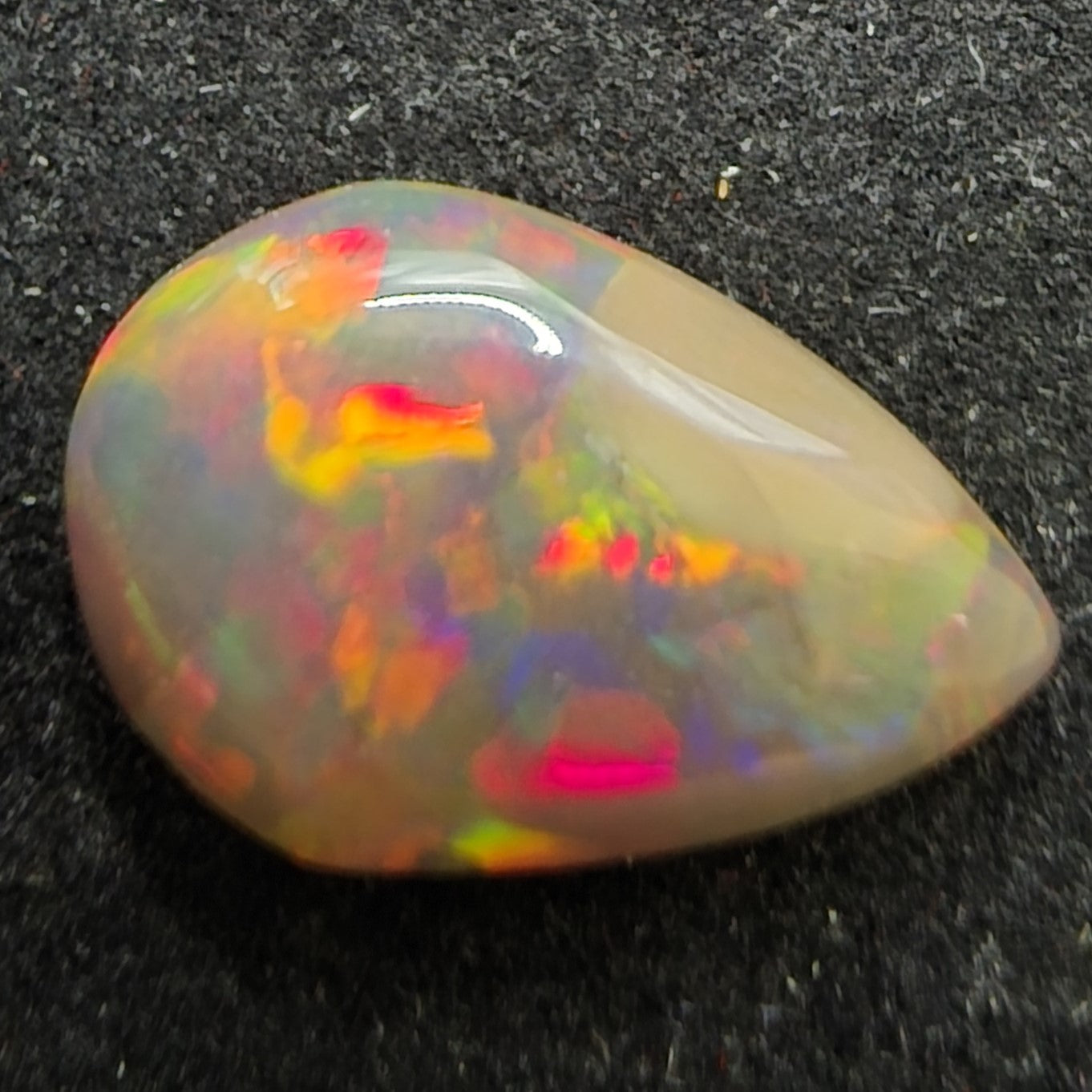 Black Opal special Ethiopian Welo, 2.7 ct pear polished, natural, intense Play-of-Colour