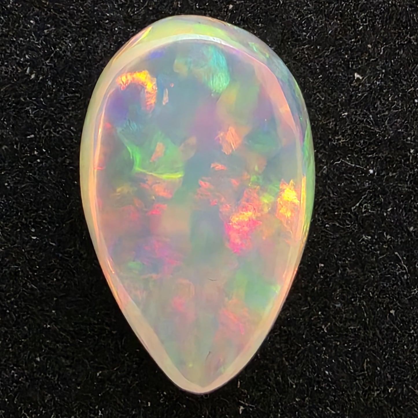 Black Opal special Ethiopian Welo, 6.1 ct pear polished, natural, intense Play-of-Colour