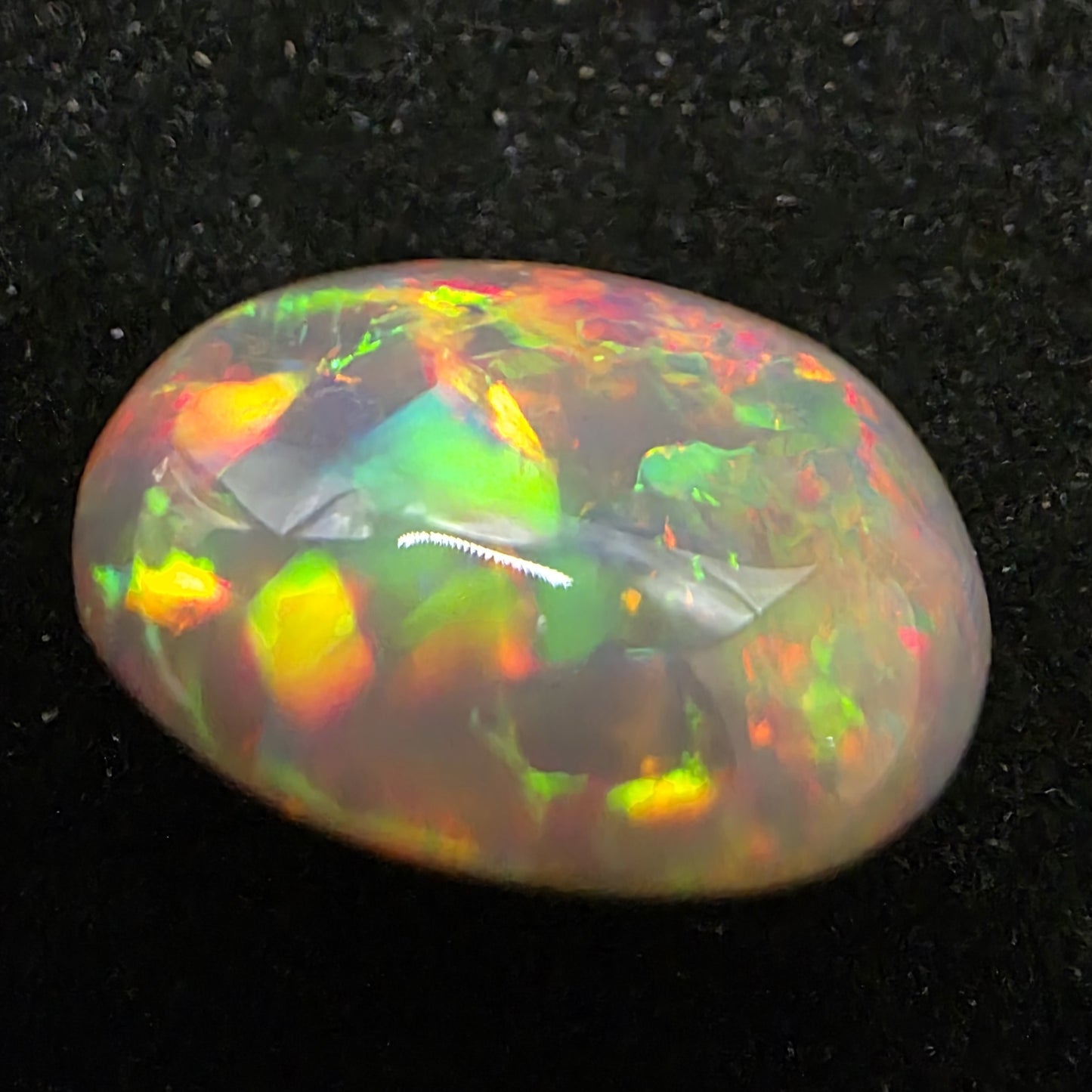 Black Opal special Ethiopian Welo, 16.8 ct oval polished, natural, intense Play-of-Colour