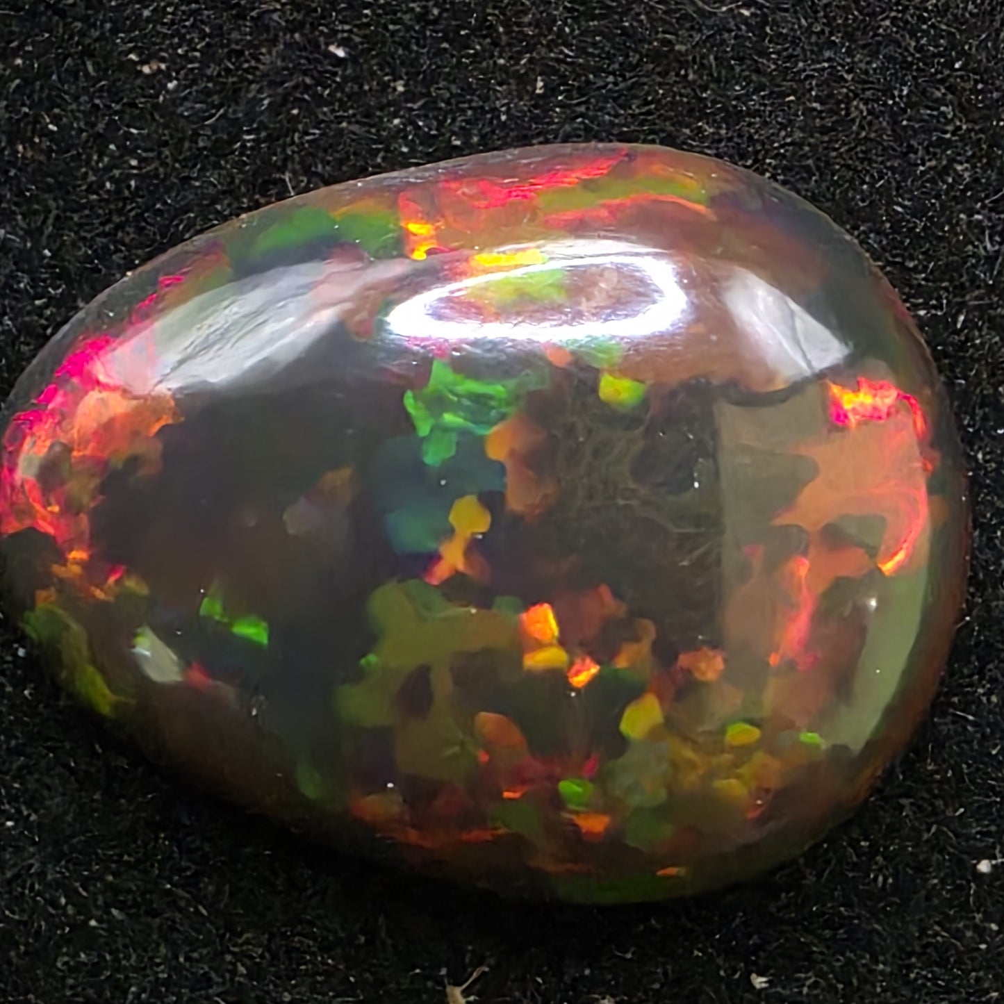 Black Opal special Ethiopian Welo, 5.9 ct pear polished, natural, intense Play-of-Colour
