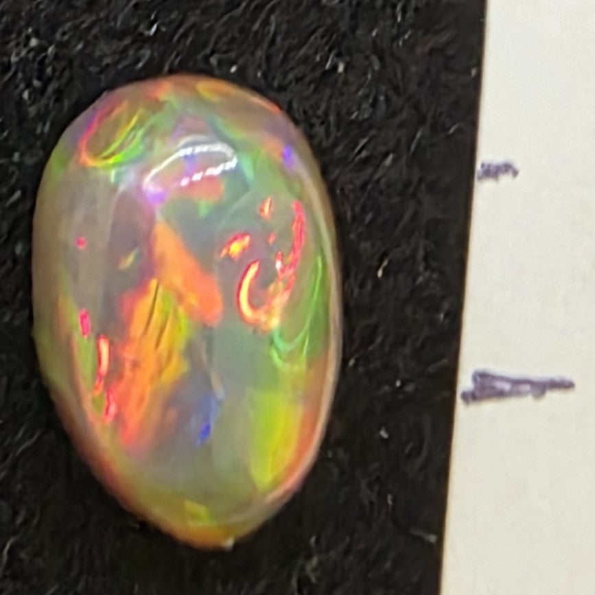 Black Opal special Ethiopian Welo, 1.45 ct oval polished, natural