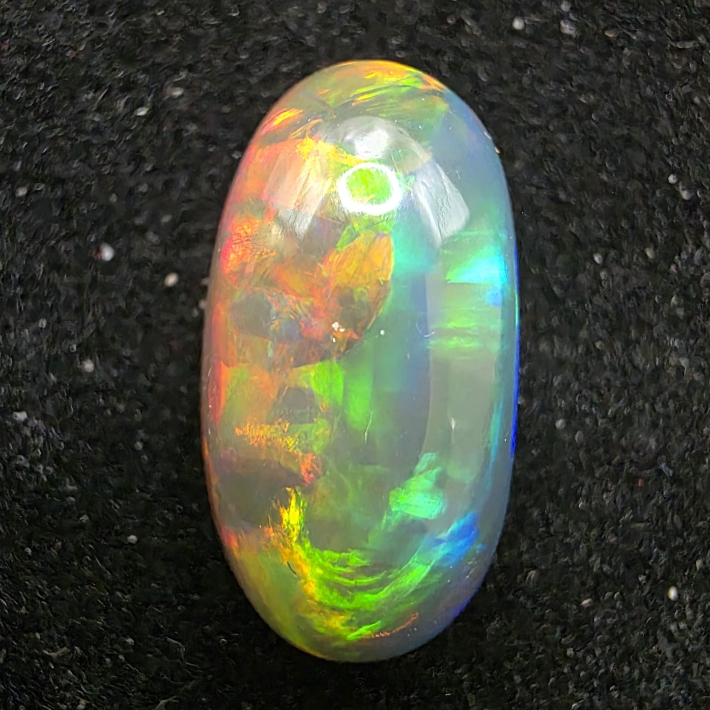 Black Opal special Ethiopian Welo, 5.4 ct oval polished, natural, intense Play-of-Colour