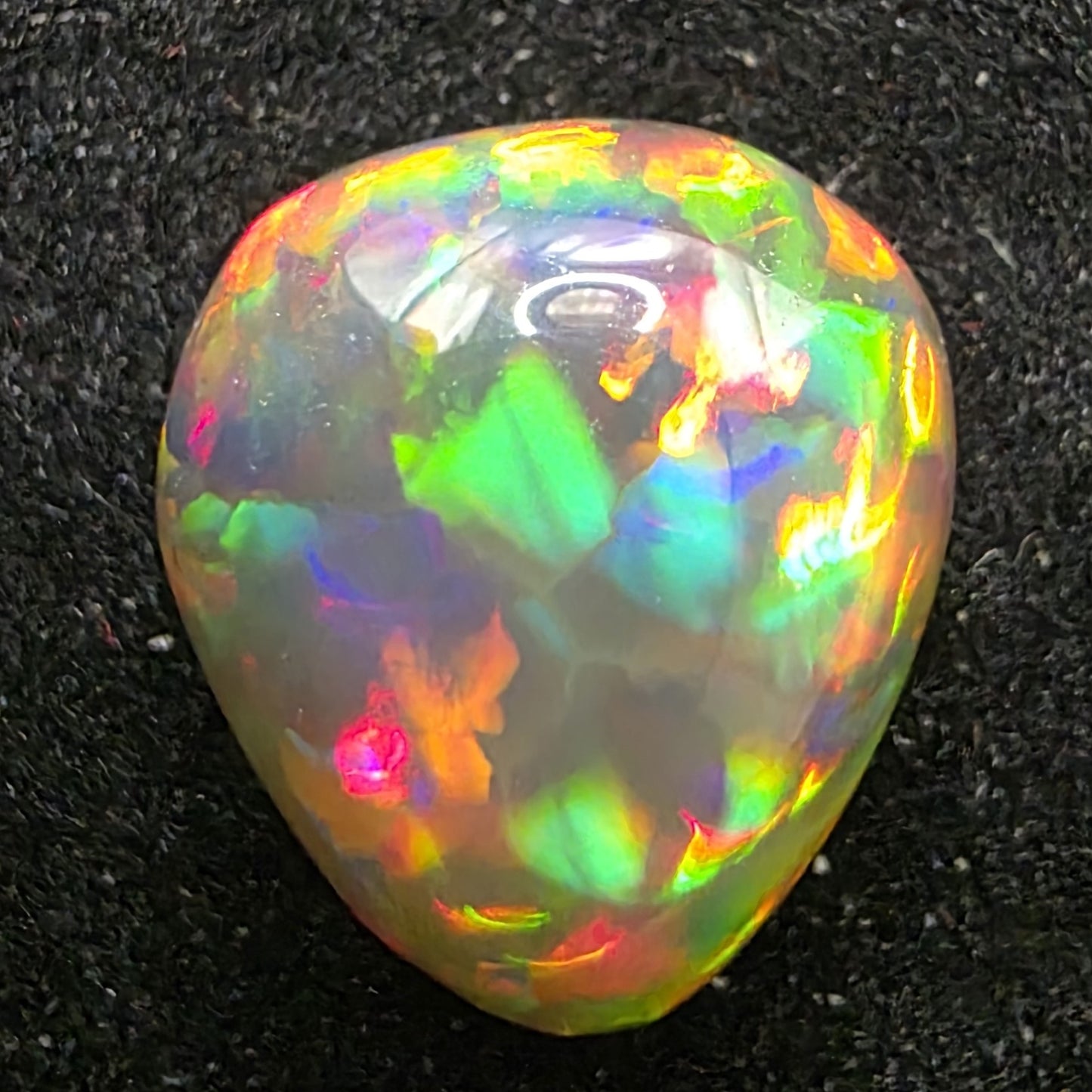 Black Opal special Ethiopian Welo, 5.6 ct pear polished, natural, intense Play-of-Colour
