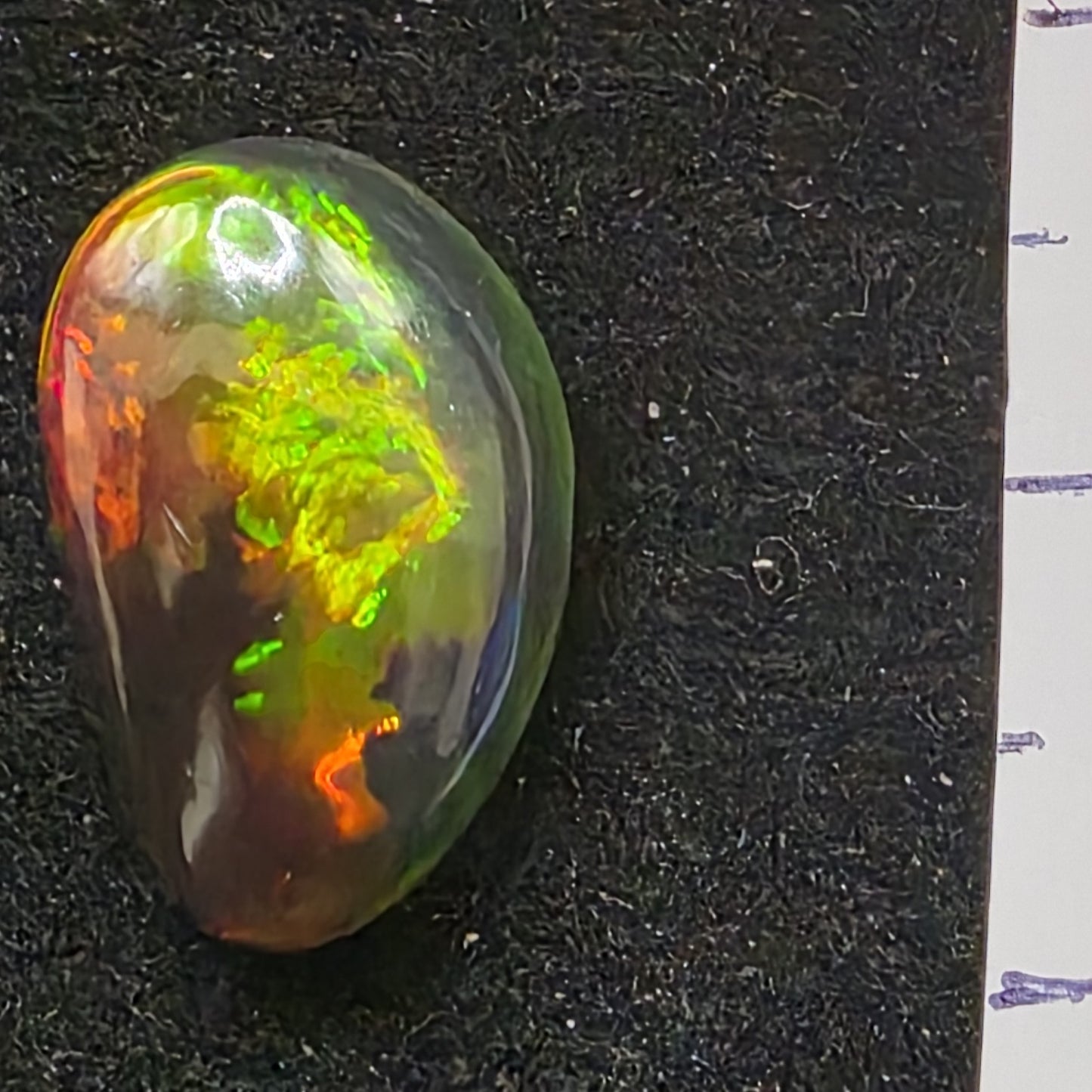 Black Opal special Ethiopian Welo, 5.45 ct freeform polished, natural, intense Play-of-Colour