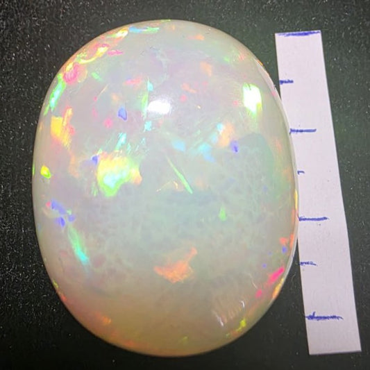 BIG stone! White Opal special Ethiopian Welo, 71.3 ct oval polished, natural, intense Play-of-Colour
