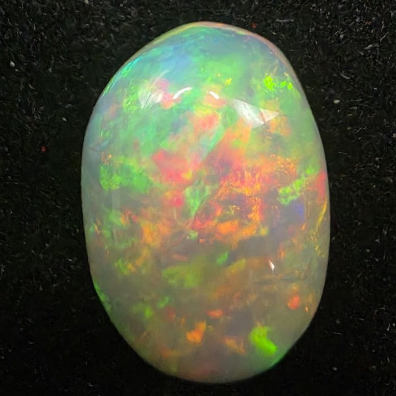 Black Opal special Ethiopian Welo, 5 ct oval polished, natural, intense Play-of-Colour