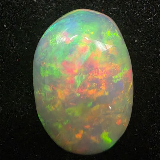 Black Opal special Ethiopian Welo, 5 ct oval polished, natural, intense Play-of-Colour