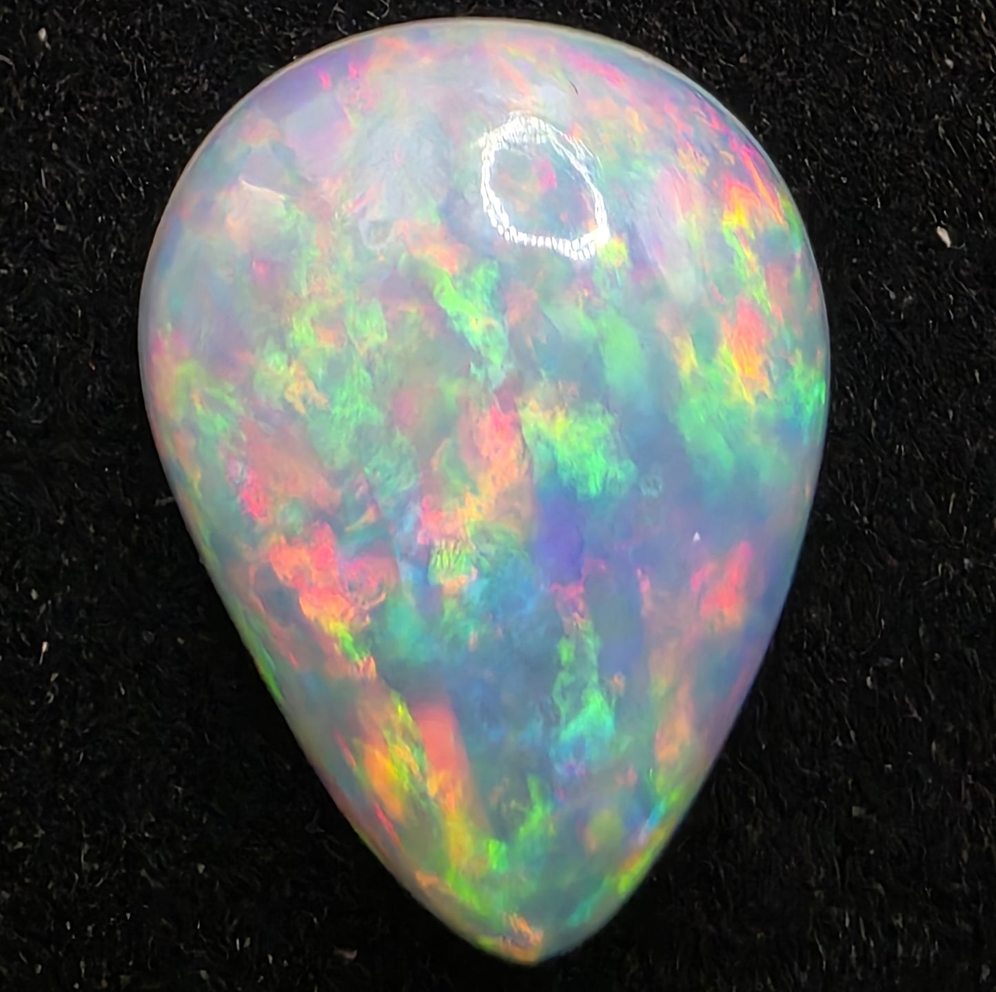 White Opal special Ethiopian Welo, 8.1 ct pear polished, natural, intense Play-of-Colour