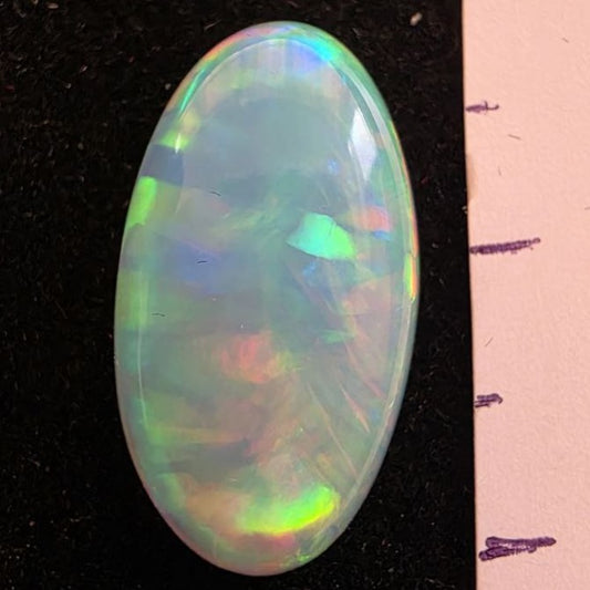 White Opal special Ethiopian Welo, 5.3 ct oval polished, natural, intense Play-of-Colour