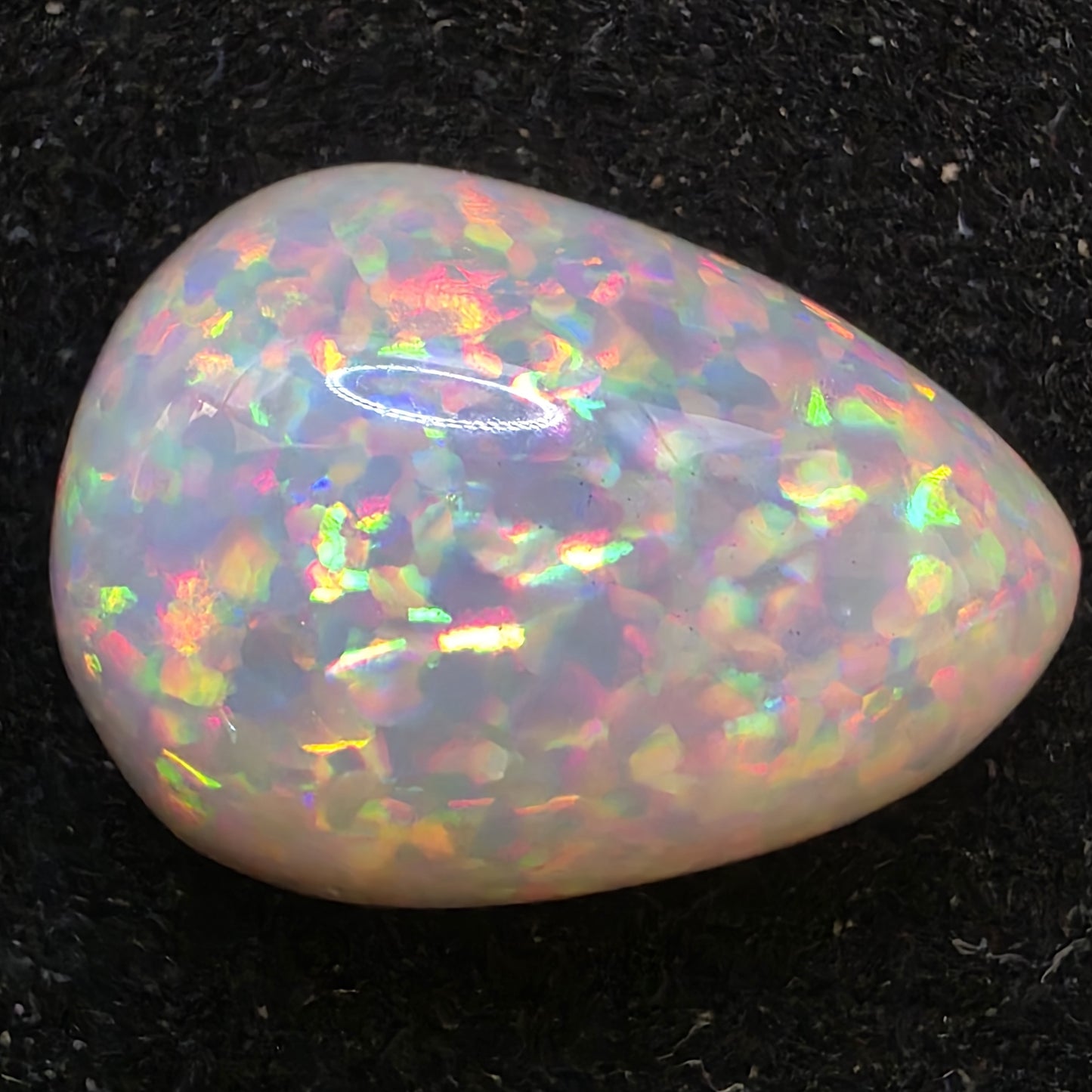 Black Opal special Ethiopian Welo, 10.3 ct pear polished, natural, intense Play-of-Colour