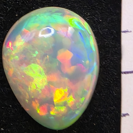 White Opal special Ethiopian Welo, 5.3 ct pear polished, natural, intense Play-of-Colour