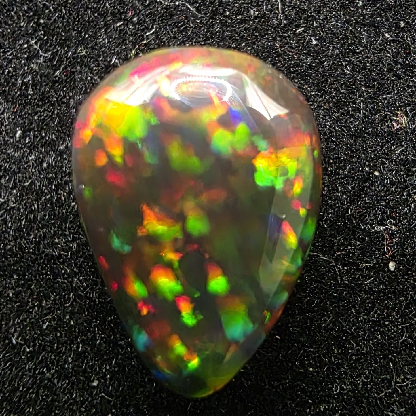 Black Opal special Ethiopian Welo, 2.2 ct pear polished, natural, intense Play-of-Colour
