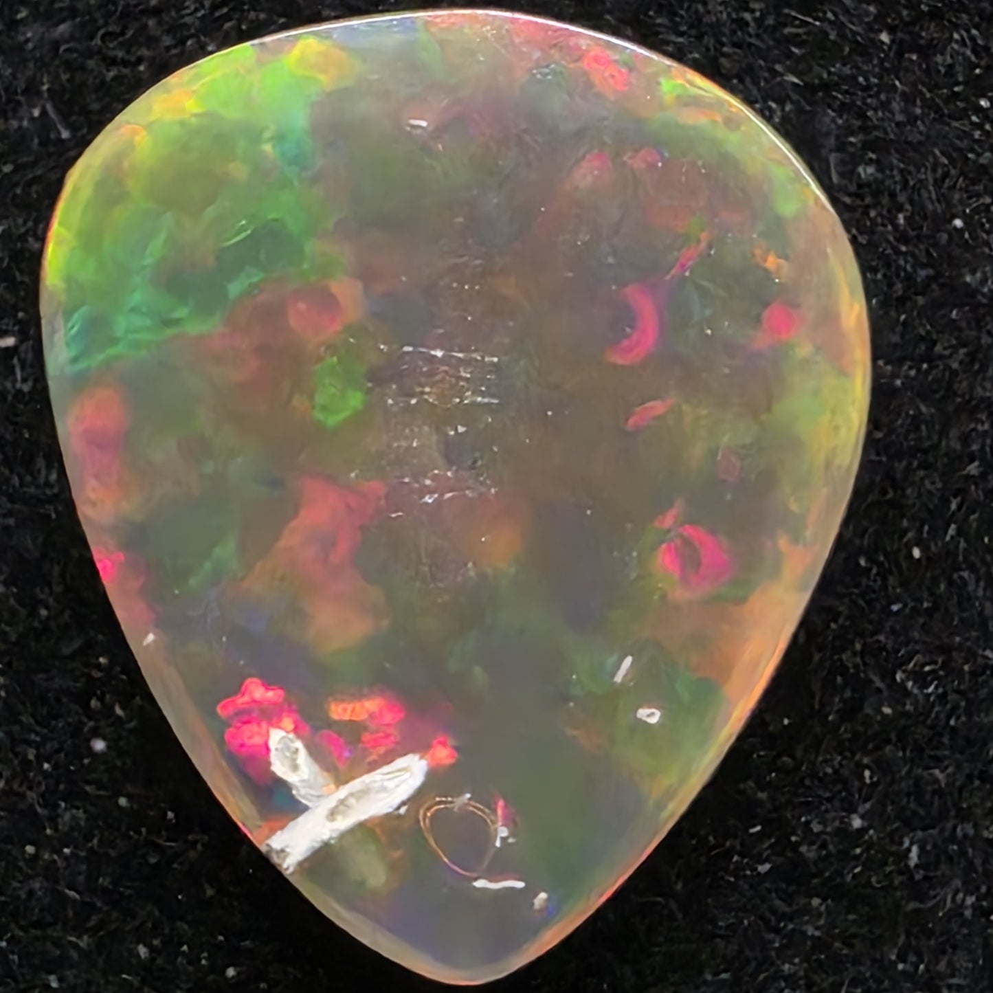 Honeycomb Black Opal special Ethiopian Welo, 3.1 ct pear polished, natural, intense Play-of-Colour