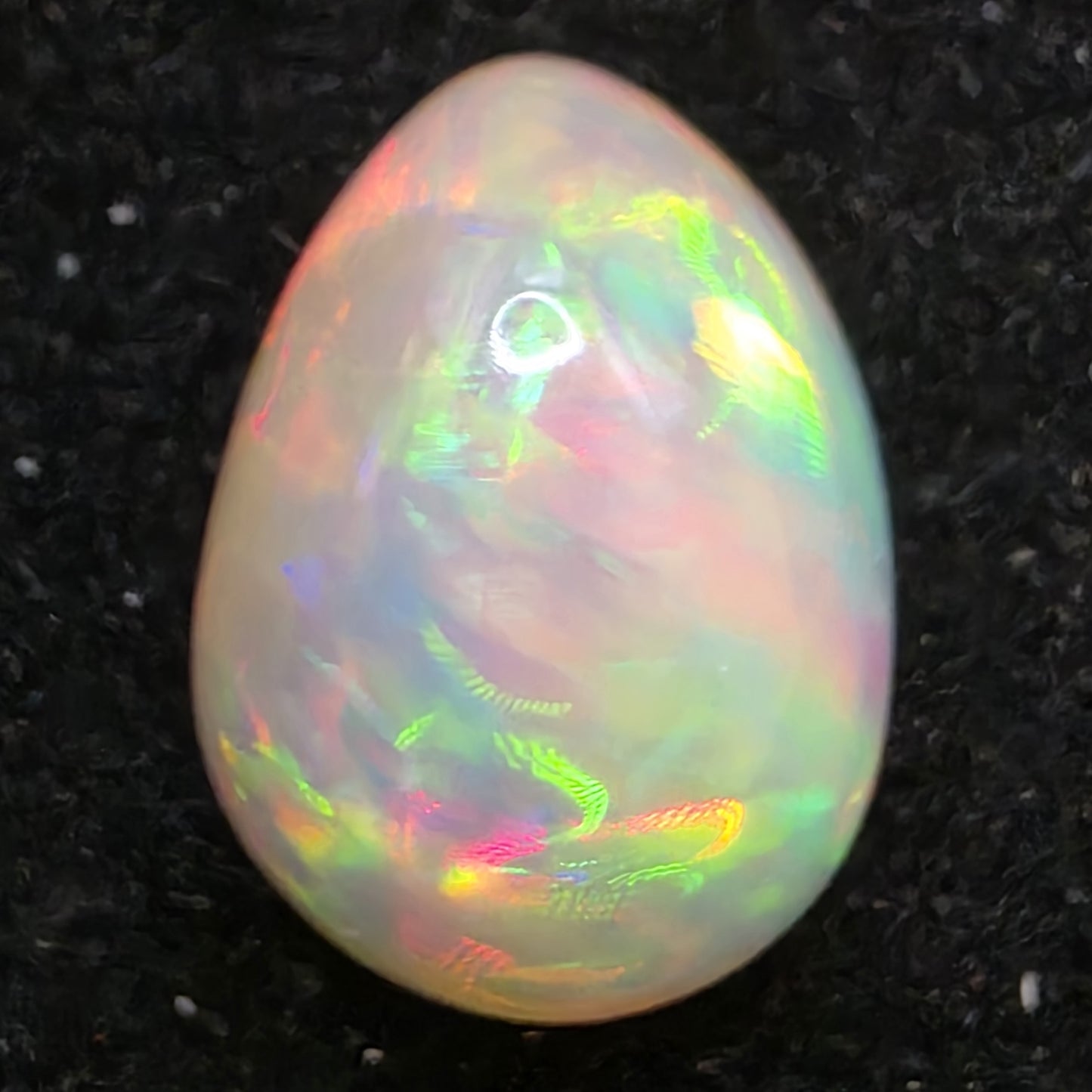 White Opal special Ethiopian Welo, 6.7 ct freeform polished, natural, intense Play-of-Colour