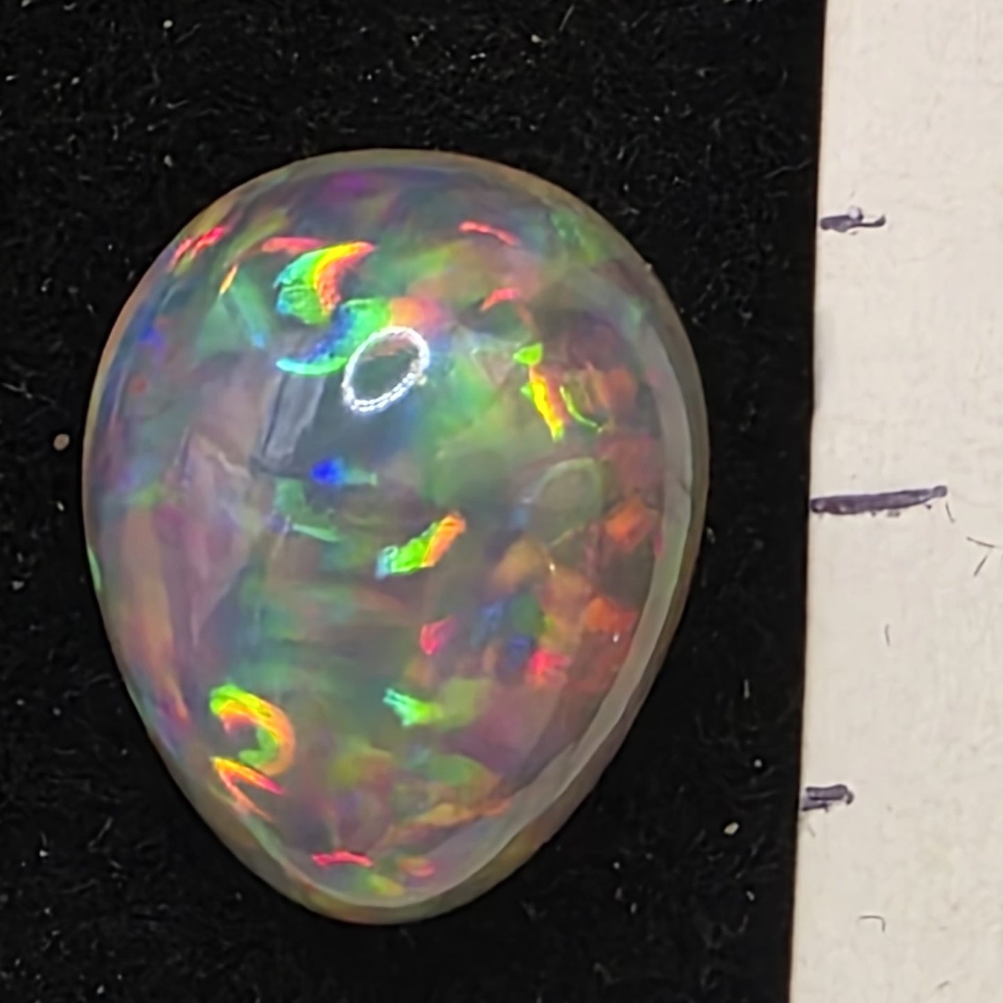 Crystal Opal special Ethiopian Welo, 4.7 ct pear polished, natural, intense Play-of-Colour