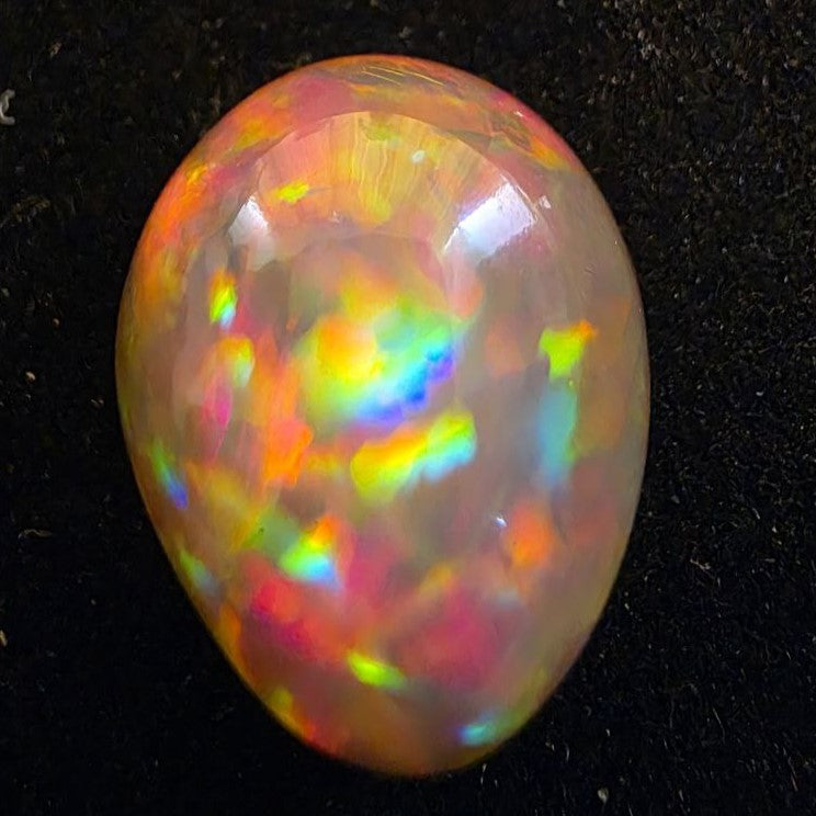 Black Opal special Ethiopian Welo, 14.35 ct pear polished, natural, intense Play-of-Colour