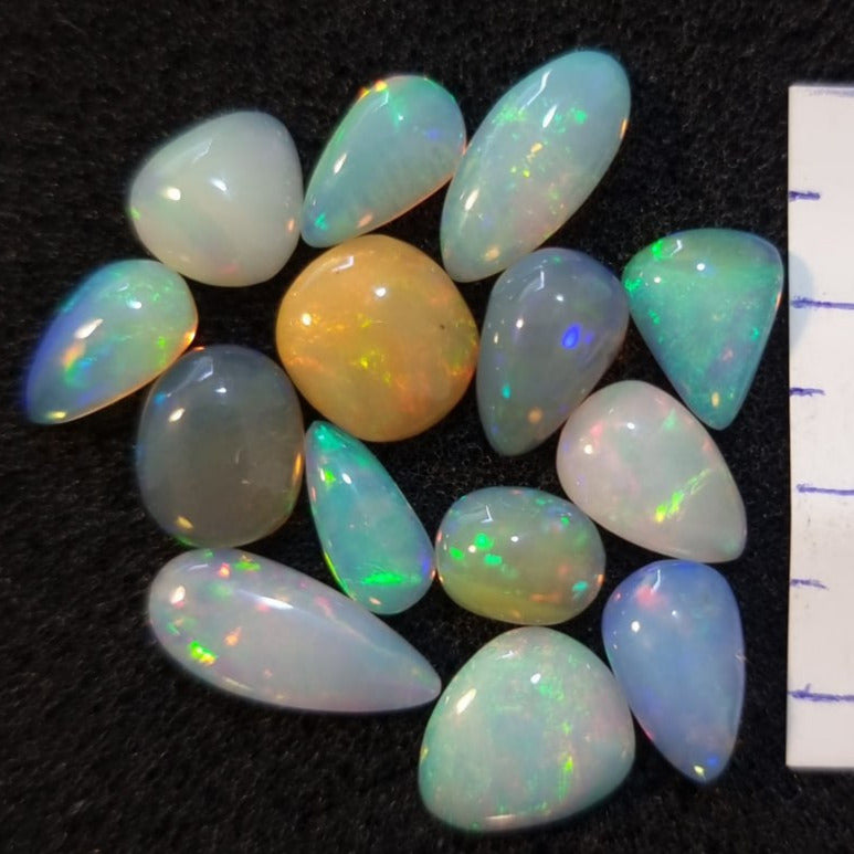 Micro-lot of 15 stones Mixed Opal Ethiopian Welo, 20.45 ct oval polished, natural