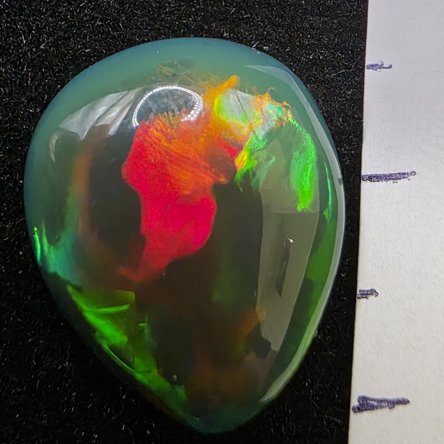 Black Opal special Ethiopian Welo, 6.7 ct pear polished, natural
