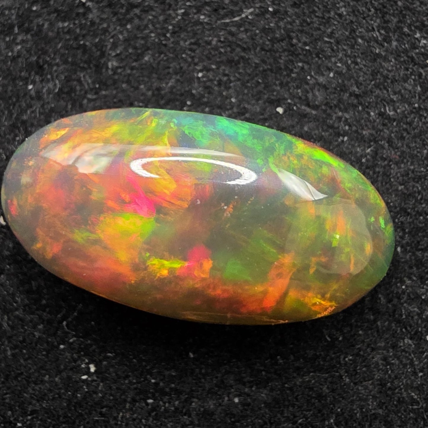 Black Opal special Ethiopian Welo, 4.3 ct oval polished, natural, intense Play-of-Colour