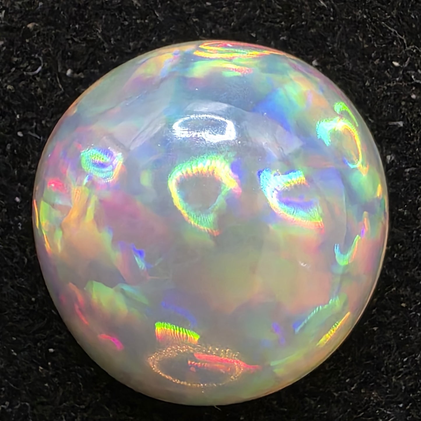 Crystal Opal special Ethiopian Welo, 6.55 ct round polished, natural, intense Play-of-Colour