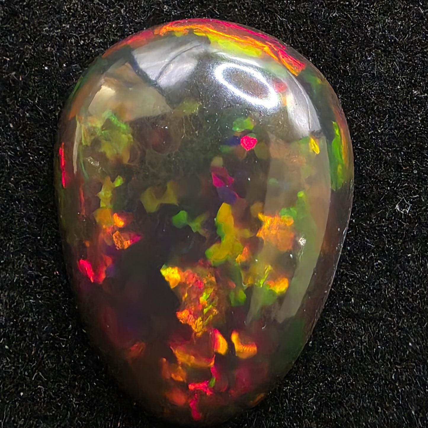 Black Opal special Ethiopian Welo, 5.9 ct pear polished, natural, intense Play-of-Colour