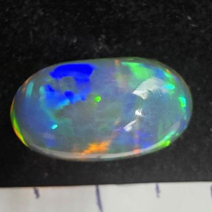 Black Opal special Ethiopian Welo, 4.8 ct oval polished, natural, intense Play-of-Colour