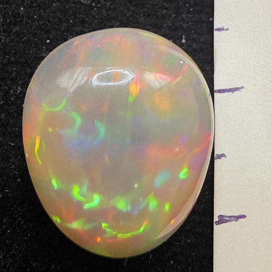 White Opal special Ethiopian Welo, 9.3 ct pear polished, natural, intense Play-of-Colour