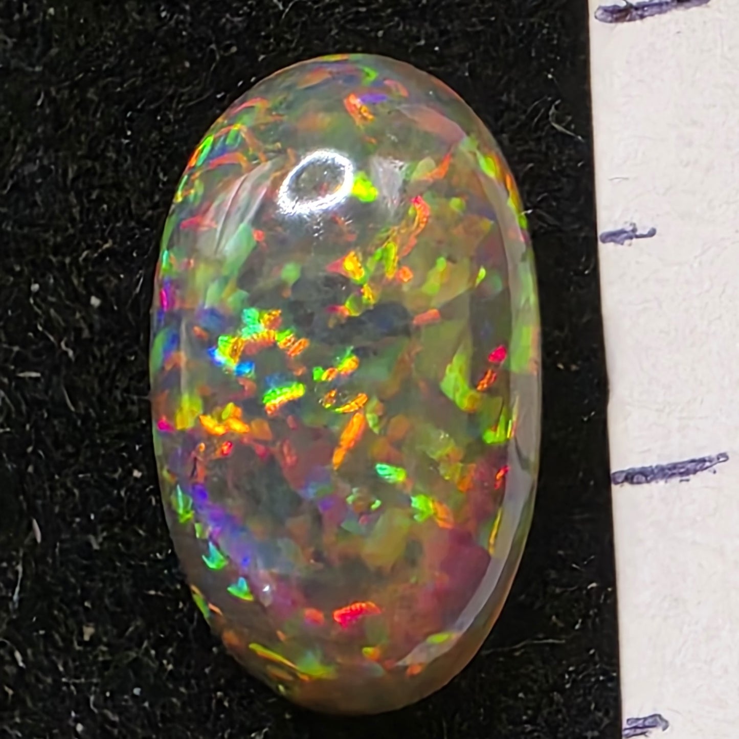 Black Opal special Ethiopian Welo, 3.2 ct oval polished, natural, intense Play-of-Colour